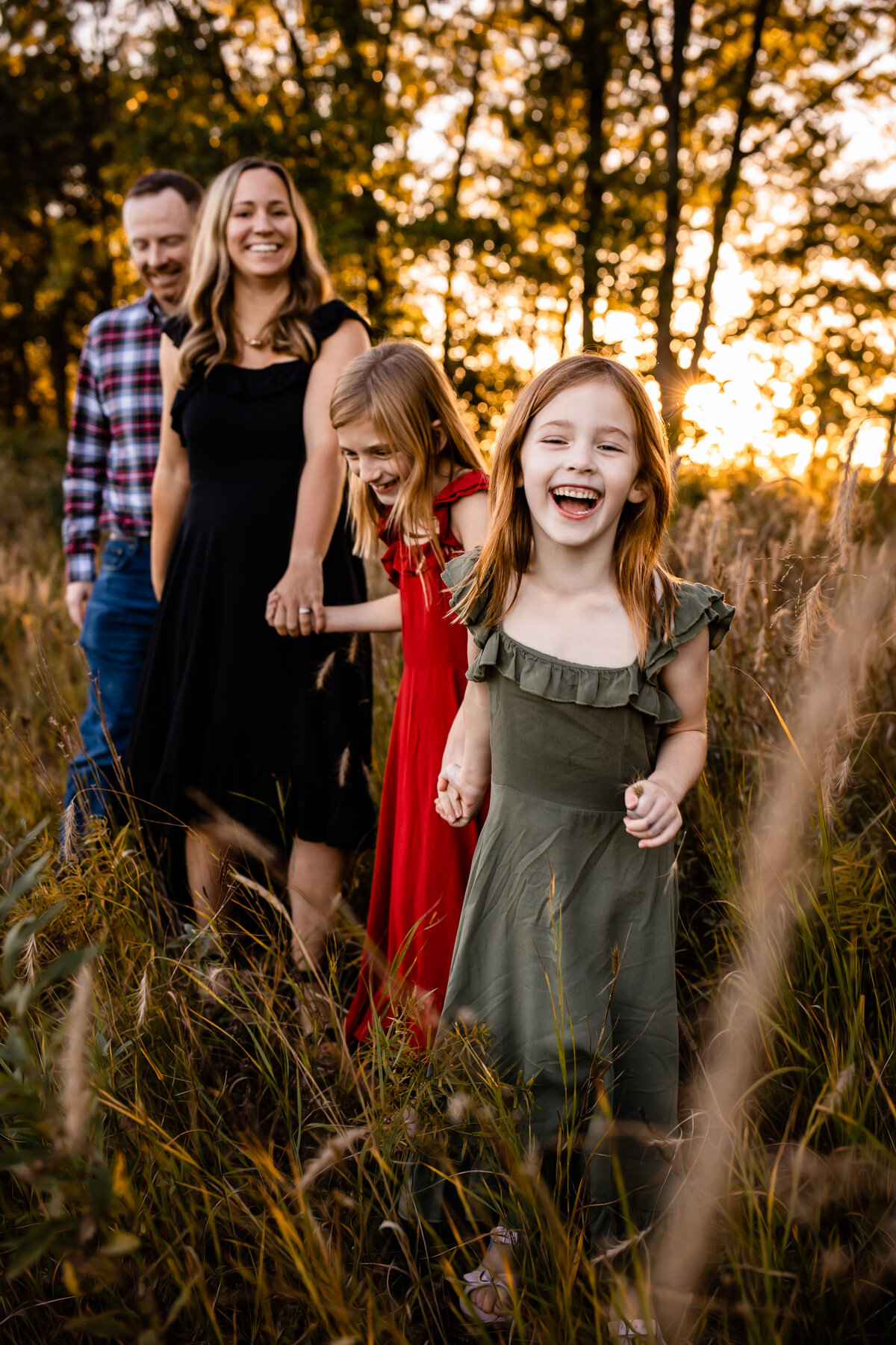 Family walking at Oak Ridge Prairie, Griffith Indiana