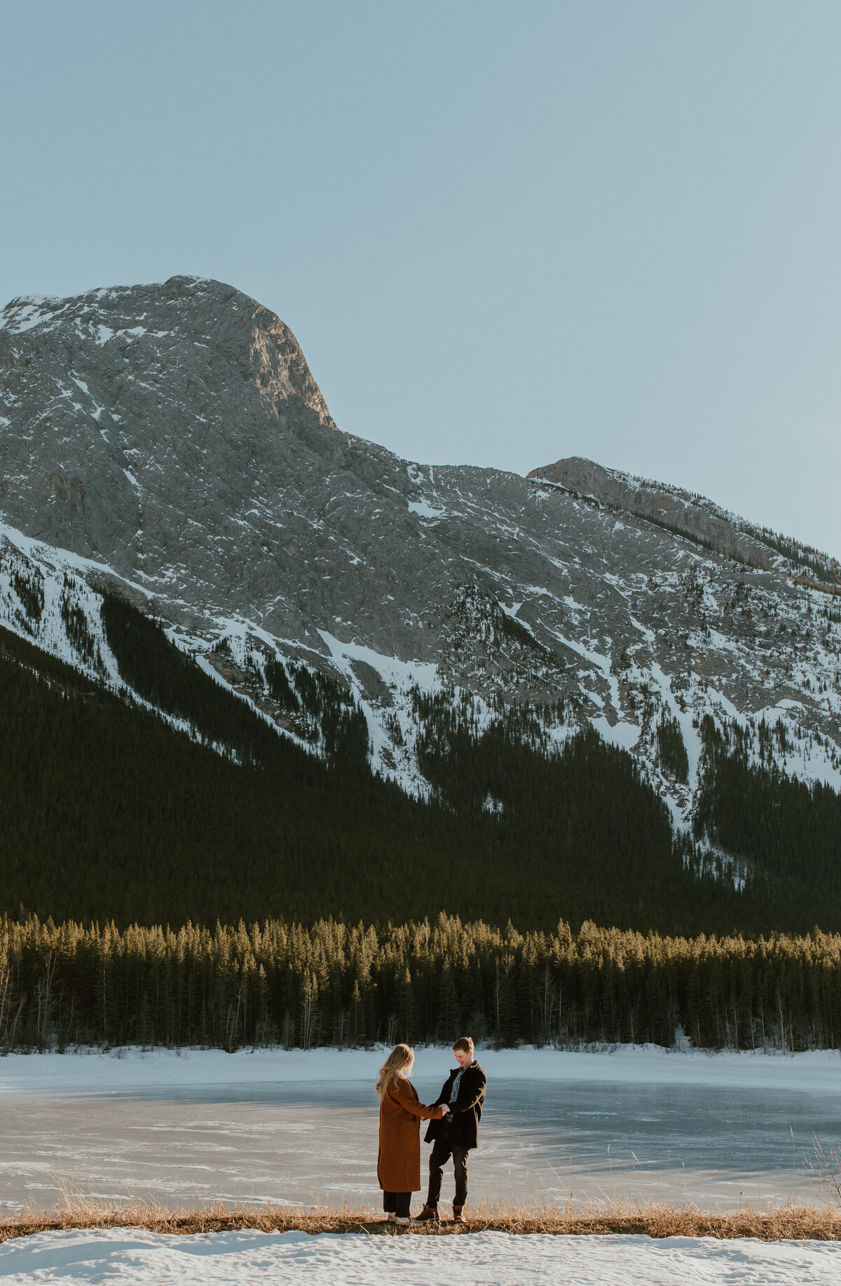 winter couple engagement session in alberta, canada