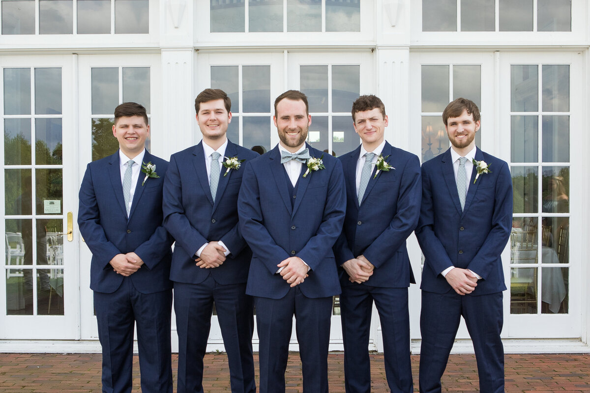 groomsmen standing together