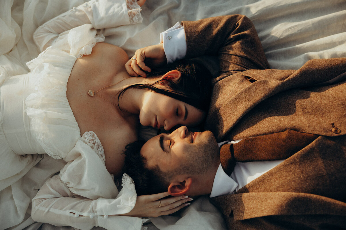 Two brides getting ready together on their wedding day, captured in an intimate, storytelling moment. At Elm House , captured by Sunshine Coast Photographer