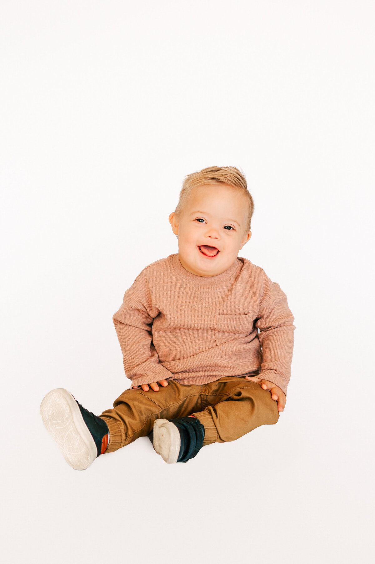 baby boy laughing in photography studio in Springfield MO
