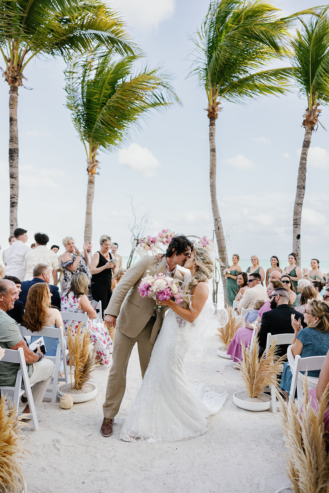 Brenda & Stephen’s joyful recessional after saying “I do” at their Cheeca Lodge wedding.