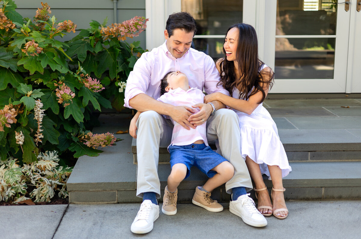 Family sitting on front steps laughing together, Bay Area Family Portfolio – Ellobelle Photography