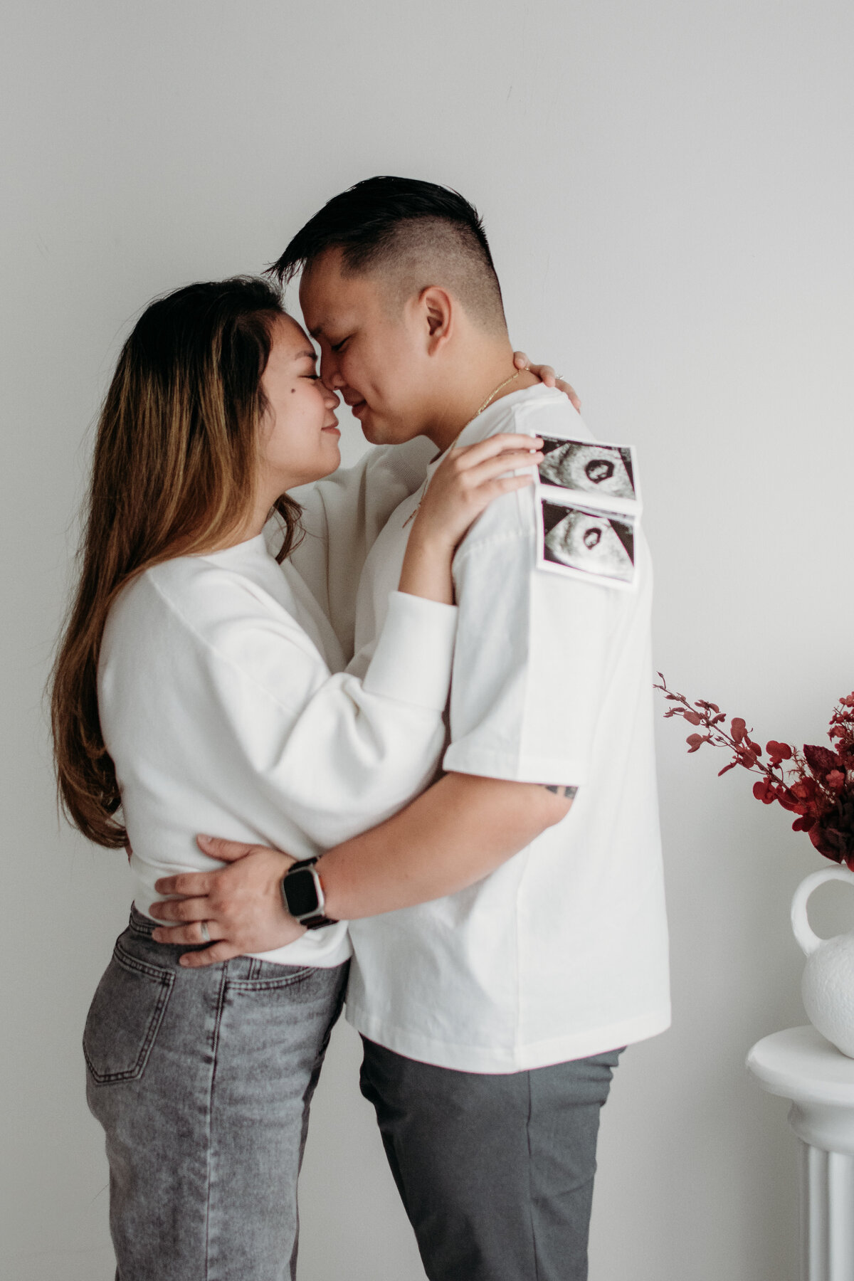 Studio Photoshoot of a pregnancy announcement in Bartlett, IL