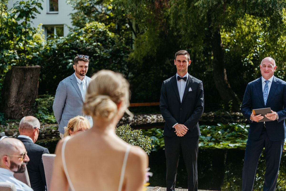 vegan wedding ceremony on natural pond dock