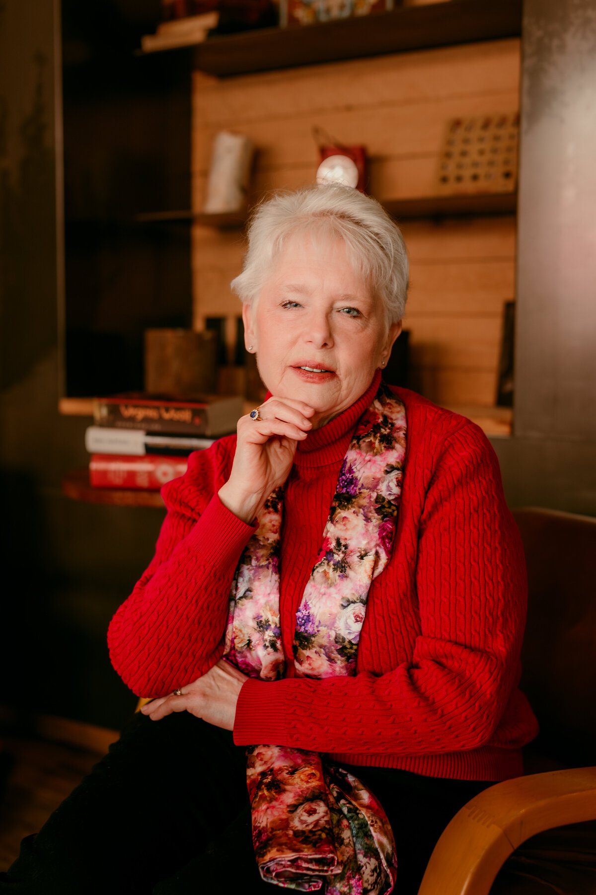 Candid lifestyle photo of a woman in a relaxed café setting, captured for her online dating profile in Minnesota