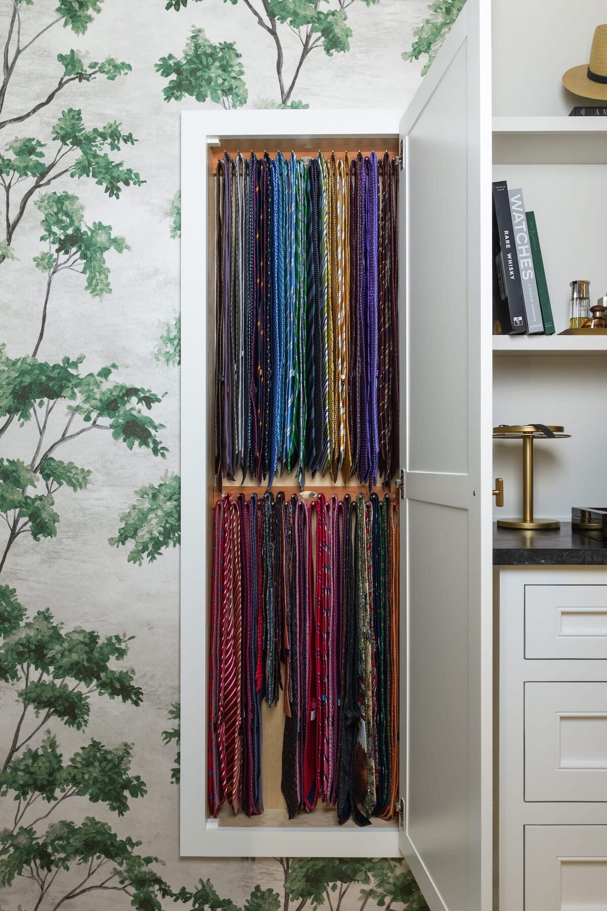 kyleen bushroe interiors coverdell mens closet with ties and tree wallpaper