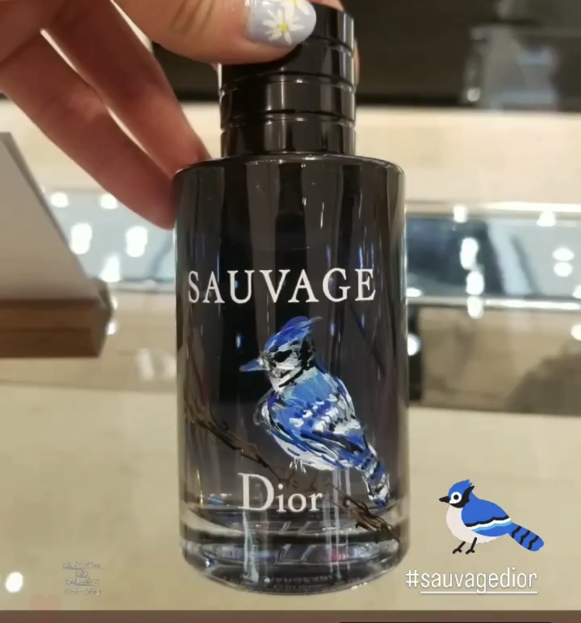 Bottle painting for luxury Dior cologne live during a brand activation by Toronto live artist Jenny Zhang