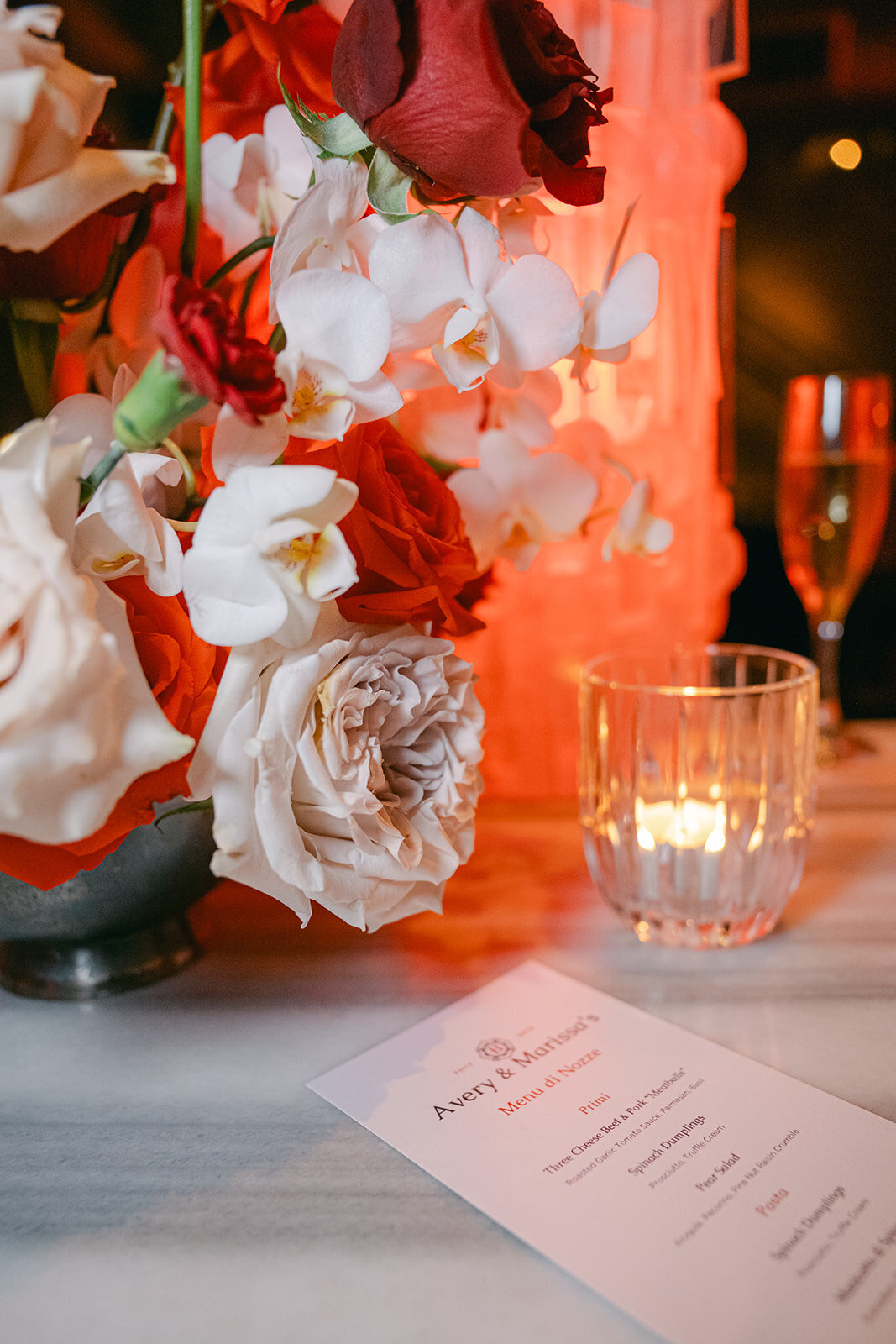Fine art close-up of vibrant floral styling on mirrored surface at downtown San Antonio reception