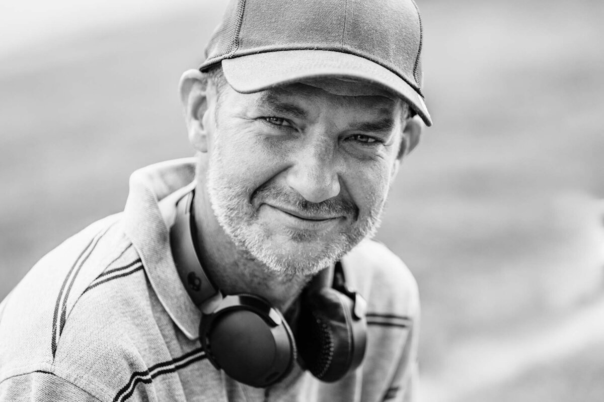 Outdoor headshot of Missoula man with headphones