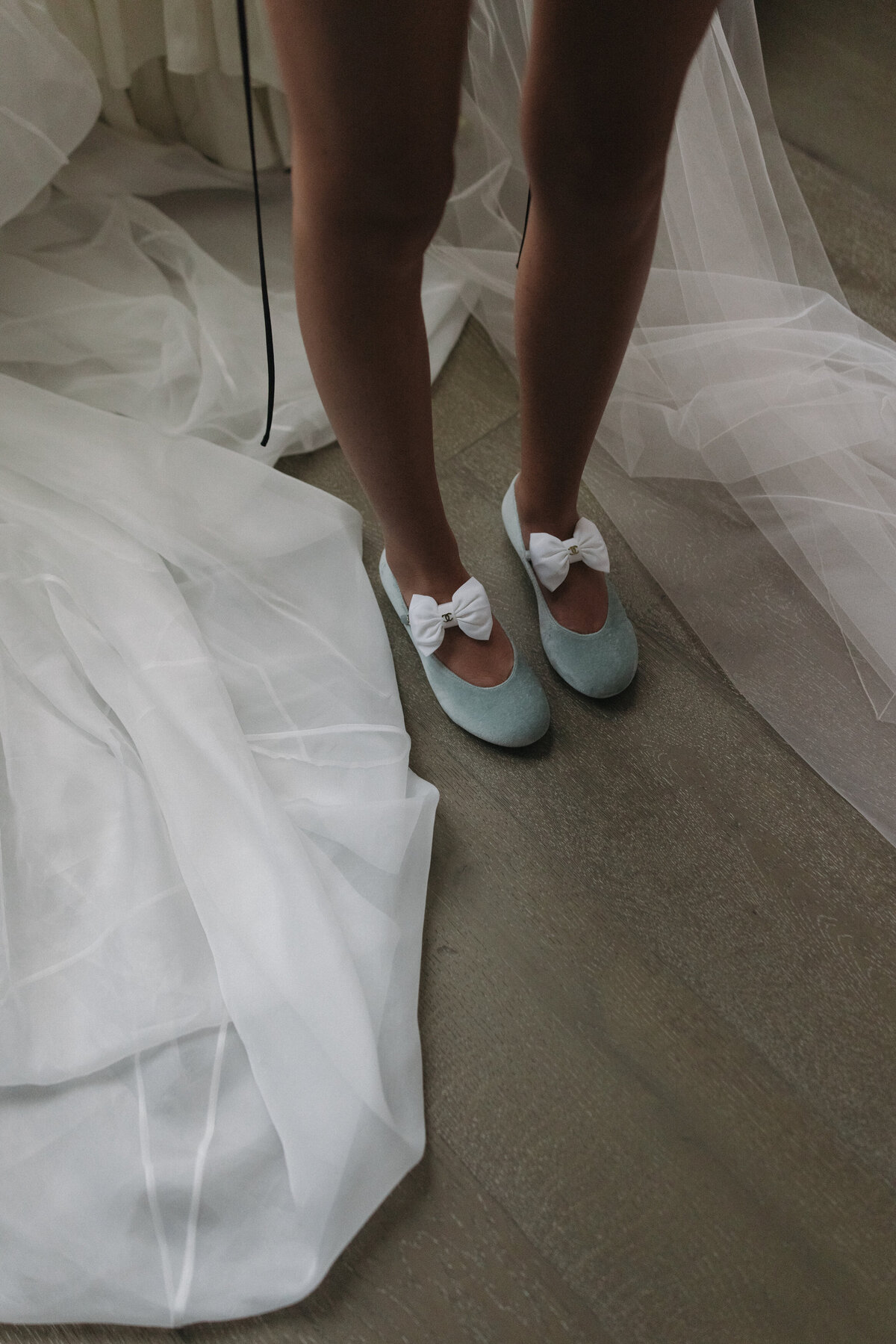 Sophisticated editorial wedding photography at NOBU Hotel Chicago featuring fashion forward bridal styling, captured with Lauren Alatriste's signature approach combining luxury wedding aesthetics with authentic preparation moments.