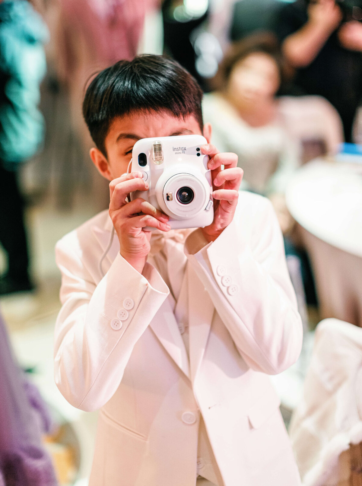 Guest with Polaroid Camera