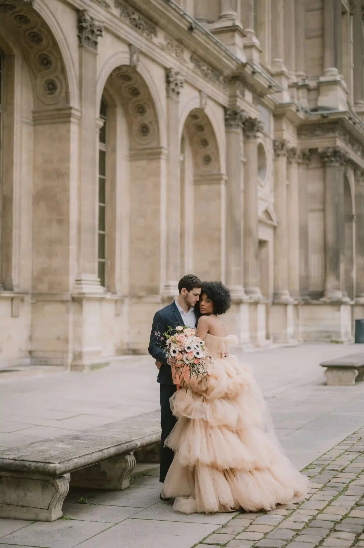 a couple having a photoshoot in paris