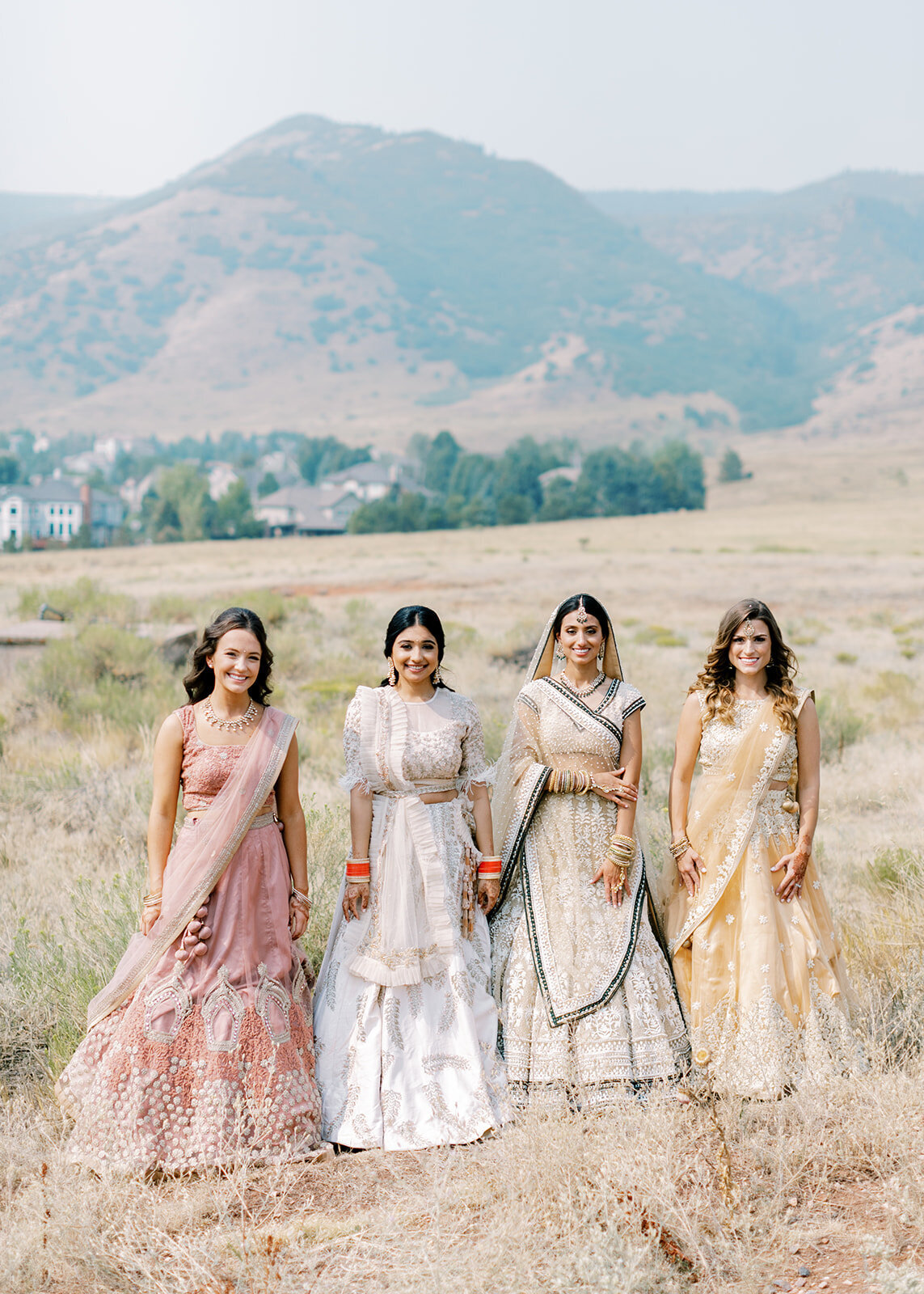 Bridal party at a South Asian Fusion wedding in Colorado with mountain backdrop
