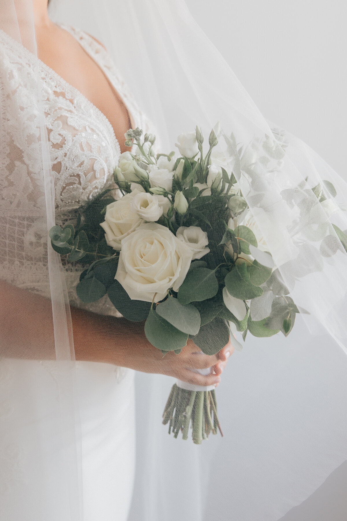 Elegant bridal bouquet with white flowers and lots of greenery