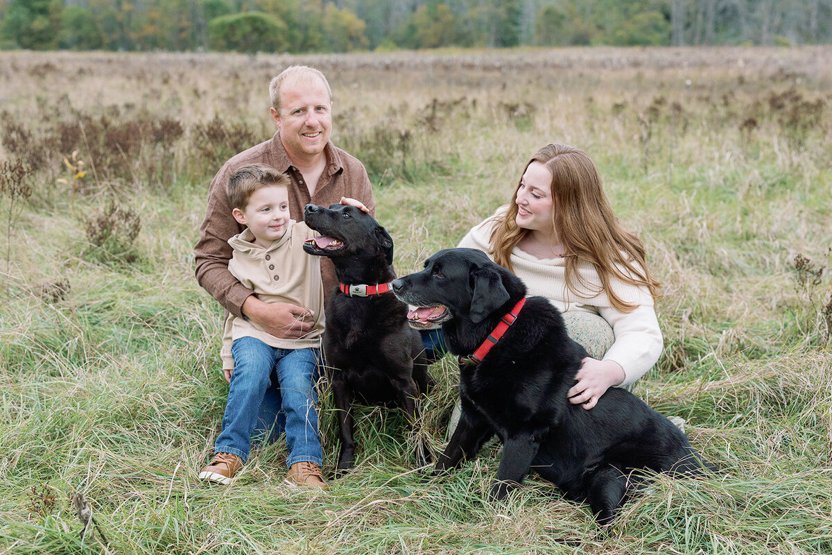 Owners Ryan and Leah Kornelsen holding their infant son