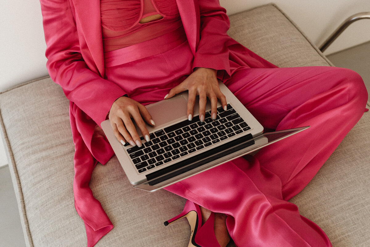 kaboompics_elegant-asian-businesswoman-in-satin-suit-focused-on-laptop-work-elegant-asian-businesswoman-in-satin-suit-focused-on-laptop-work-32063