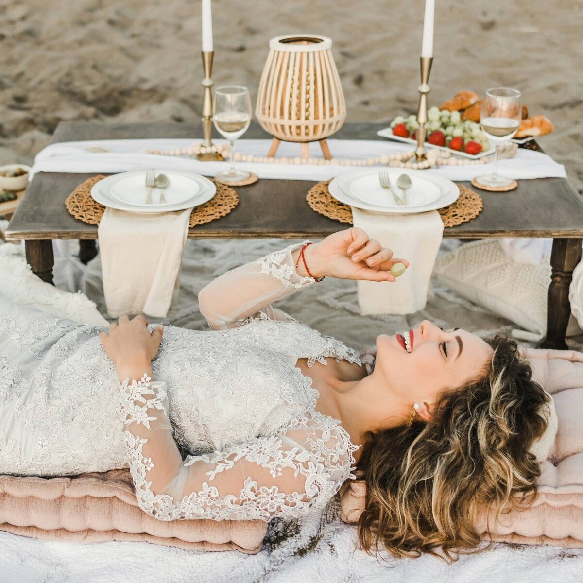 Boho chic Bride picnic on the sand