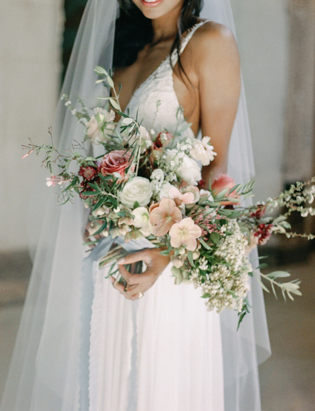 soft film photography of bridal bouquet with olive leaves, Mediterranean wedding photographer