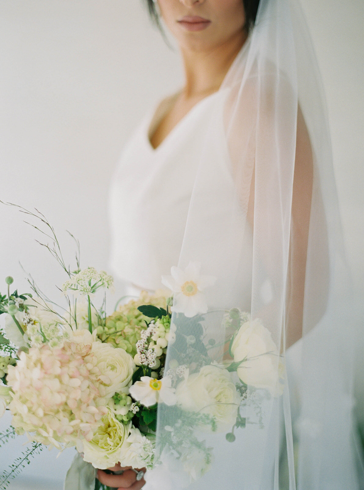 Bride holding custom bouquet for Earthy Bridal Editorial - Within the Flowers