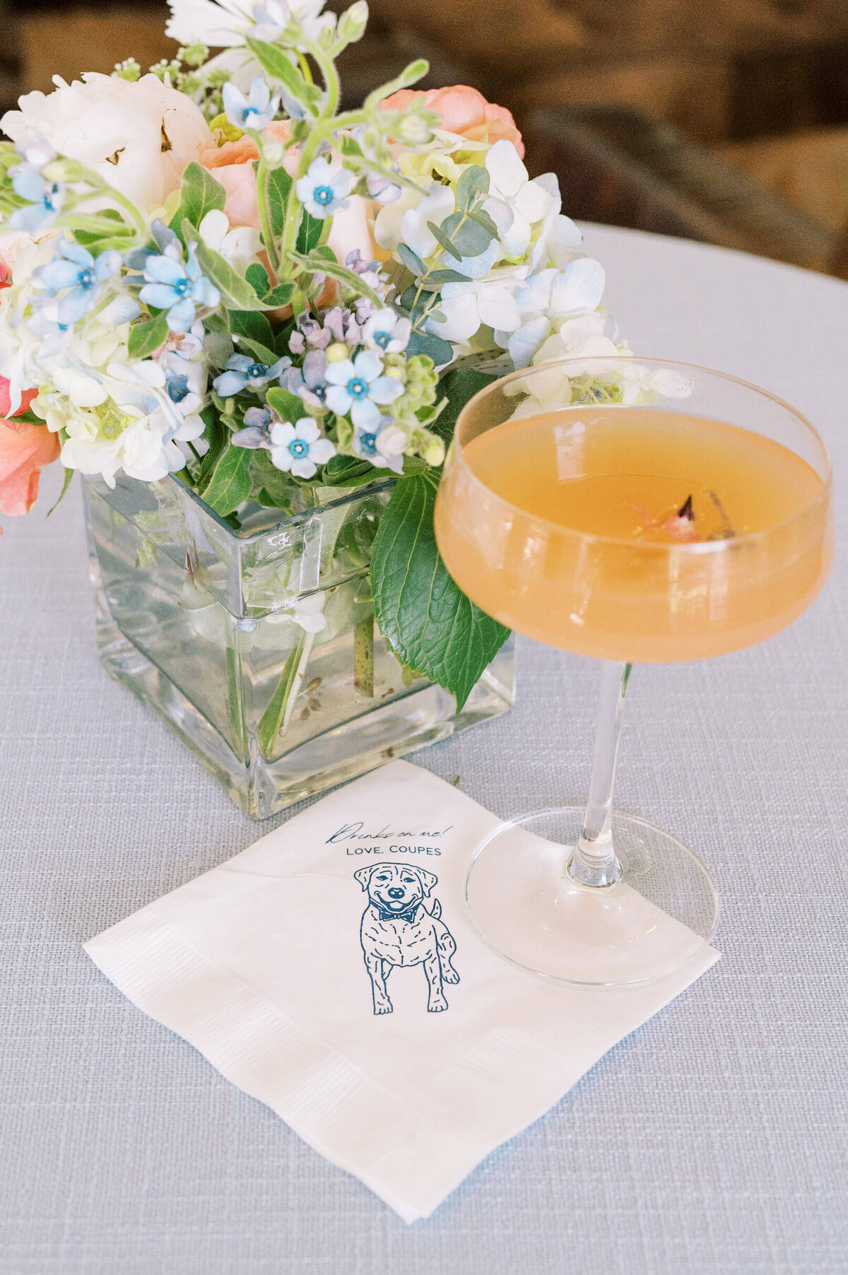 Signature cocktail with personalized napkin
