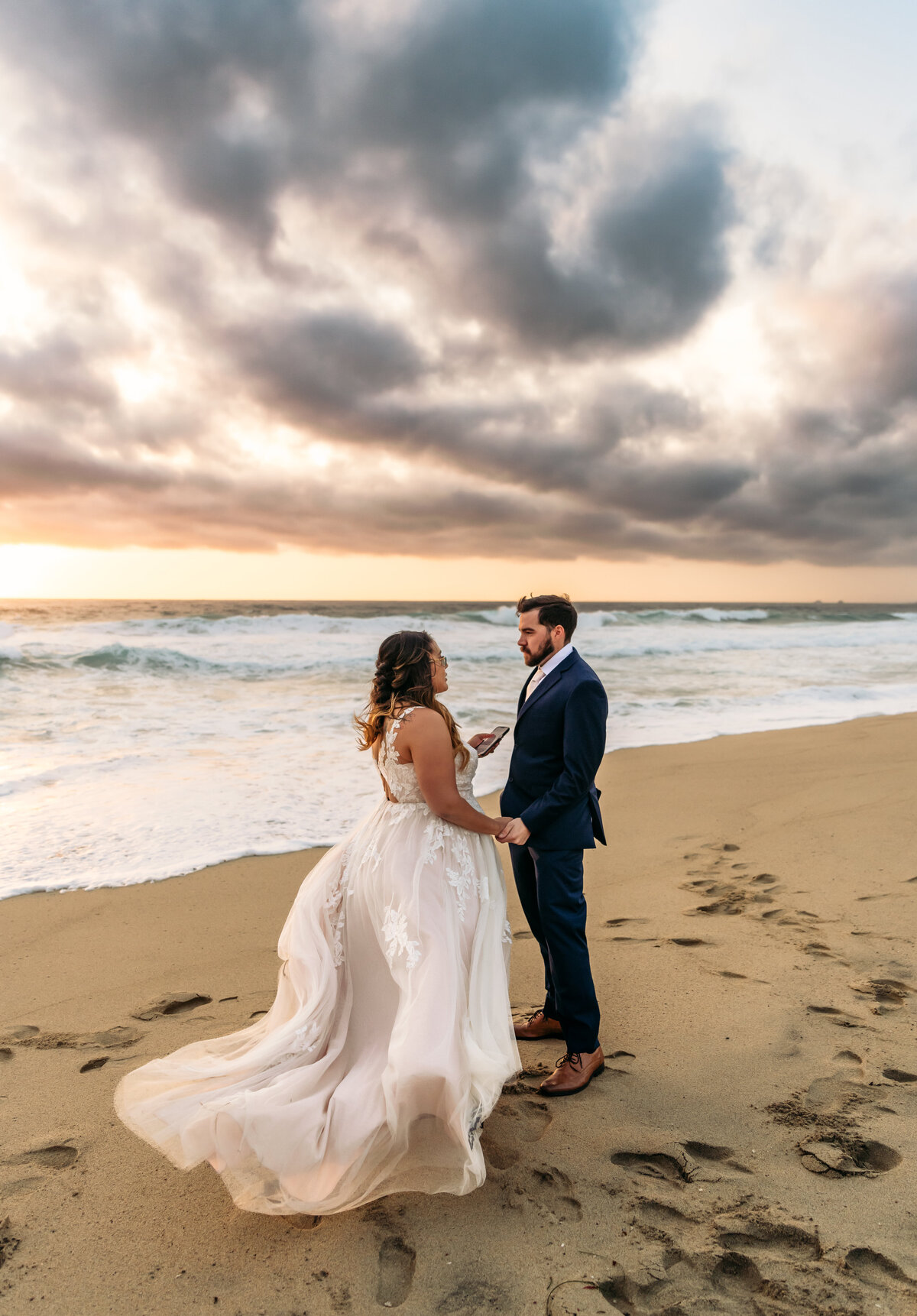 wedding photos on the beach during golden hour