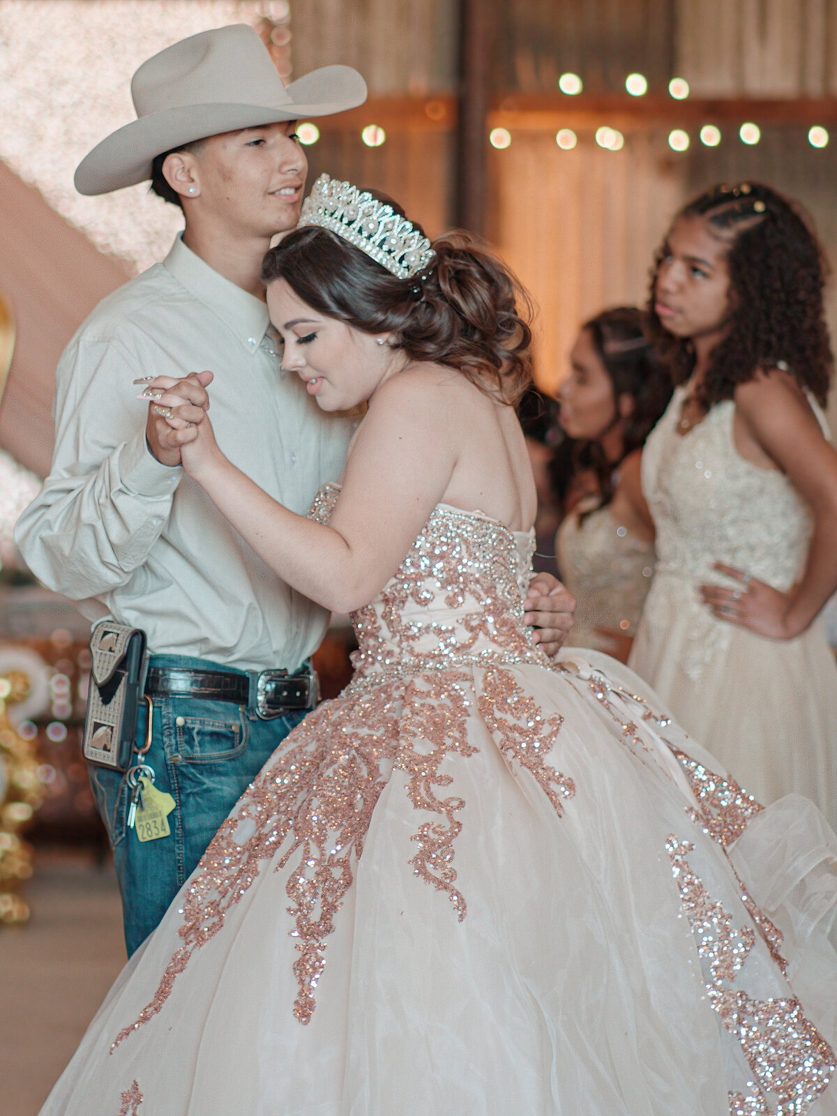 Quinceanera dancing with the  Chambelan