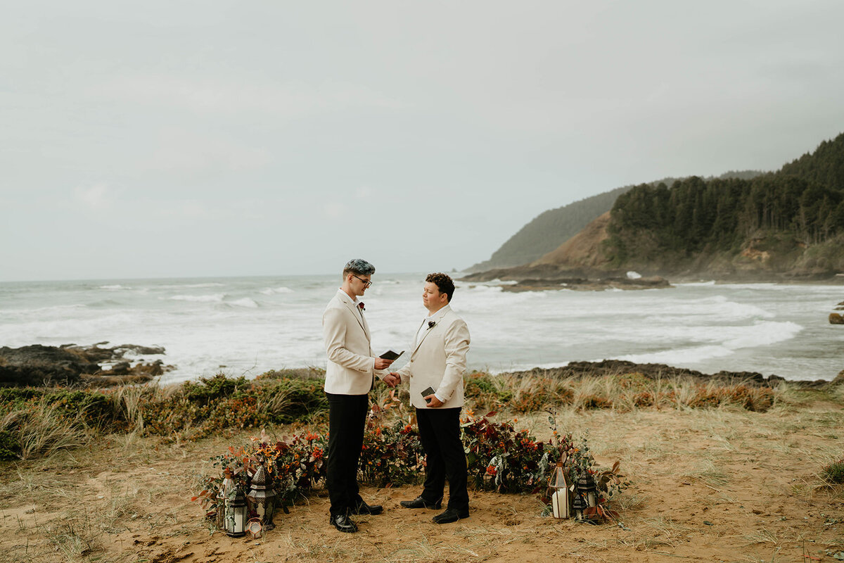 LGBTQ couple exchanging vows at their Oregon Coast elopement
