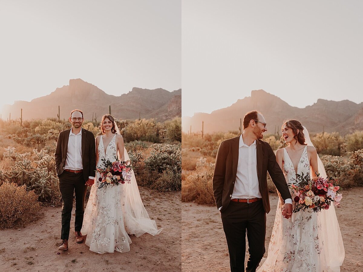 Wedding couple walk toward the camera joyfully at sunset in the Phoenix mountains