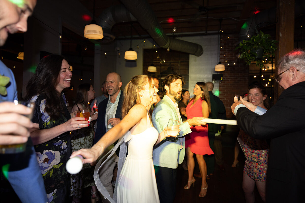 Bride dances in reception dance lights at her wedding reception in New York City. 