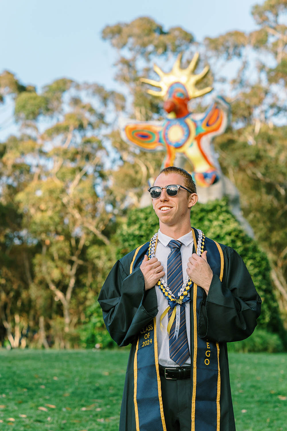 Cap and gown photos at the Sun God at UC San Diego