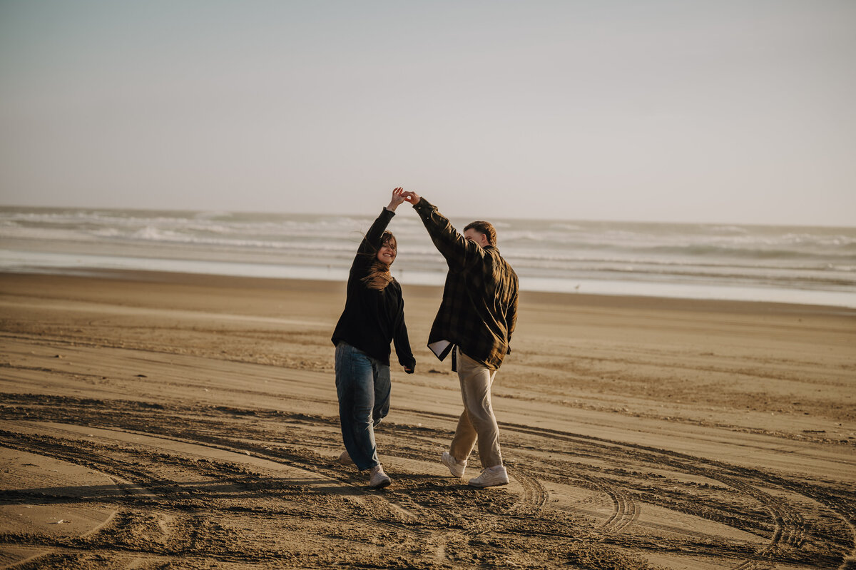 Photograph of couple dancing on beach in Alberta