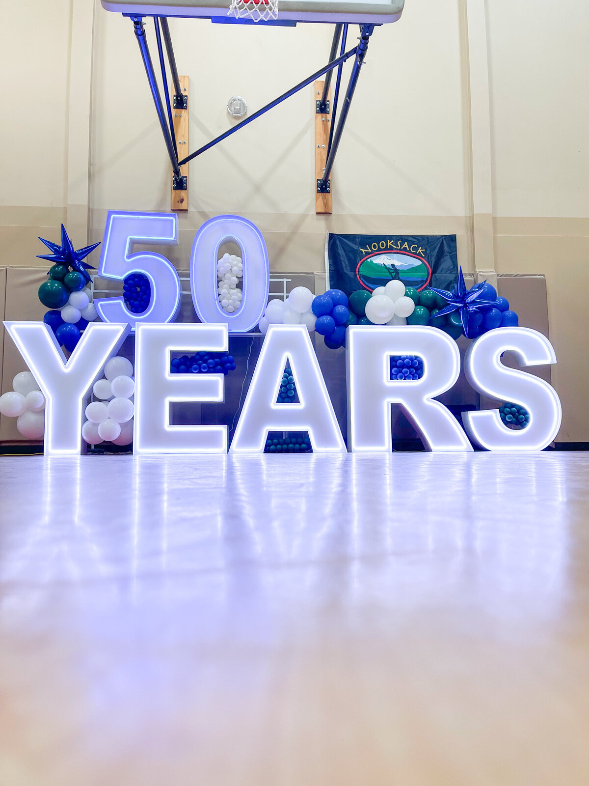 50 years marquee letters and balloons
