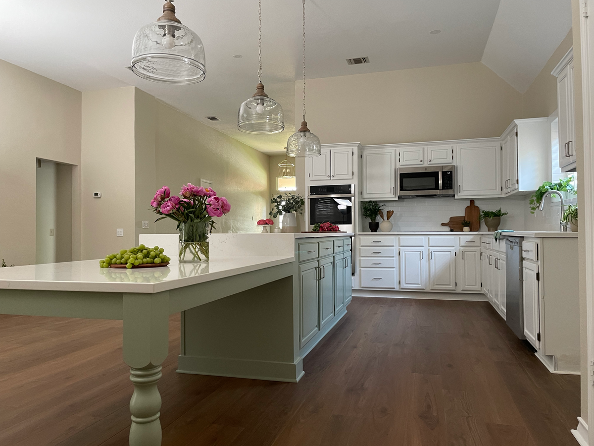 dusti j design clear lights and white and green kitchen