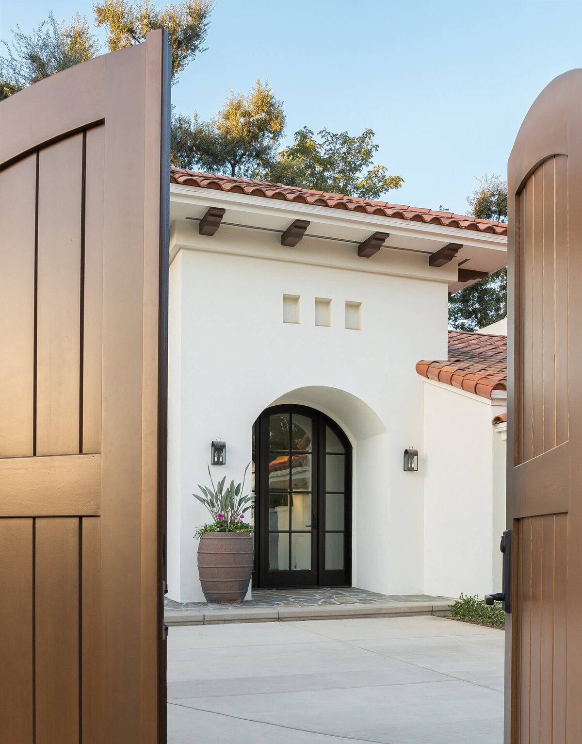 spanish-home-gated-entry-arched-doorway