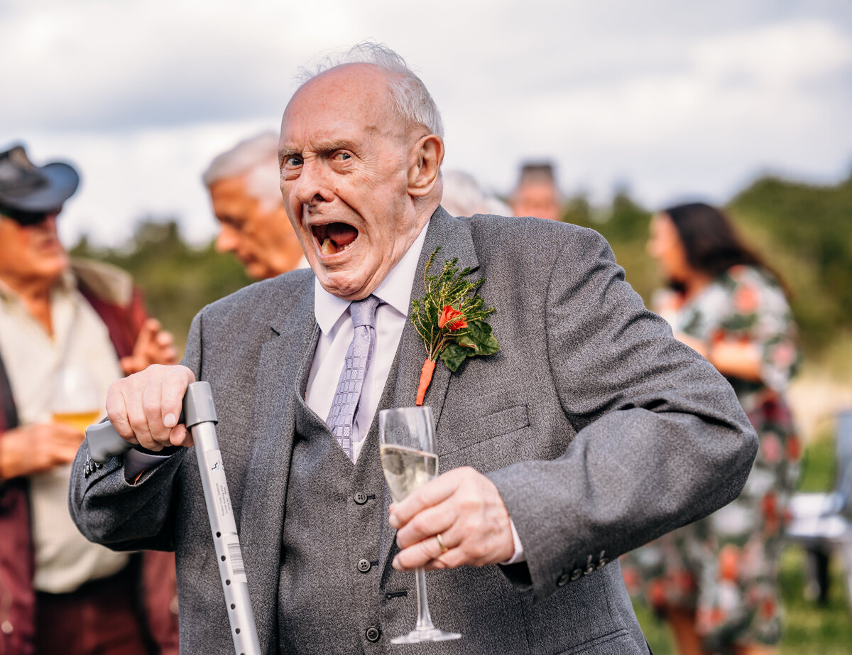 Grandad having fun on wedding day