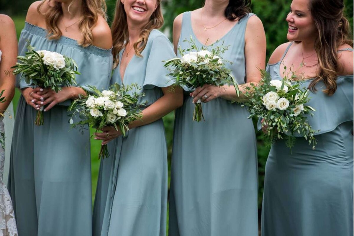 Dusty blue bridesmaids dresses at  a luxury Italian inspired Chicago North Shore wedding.