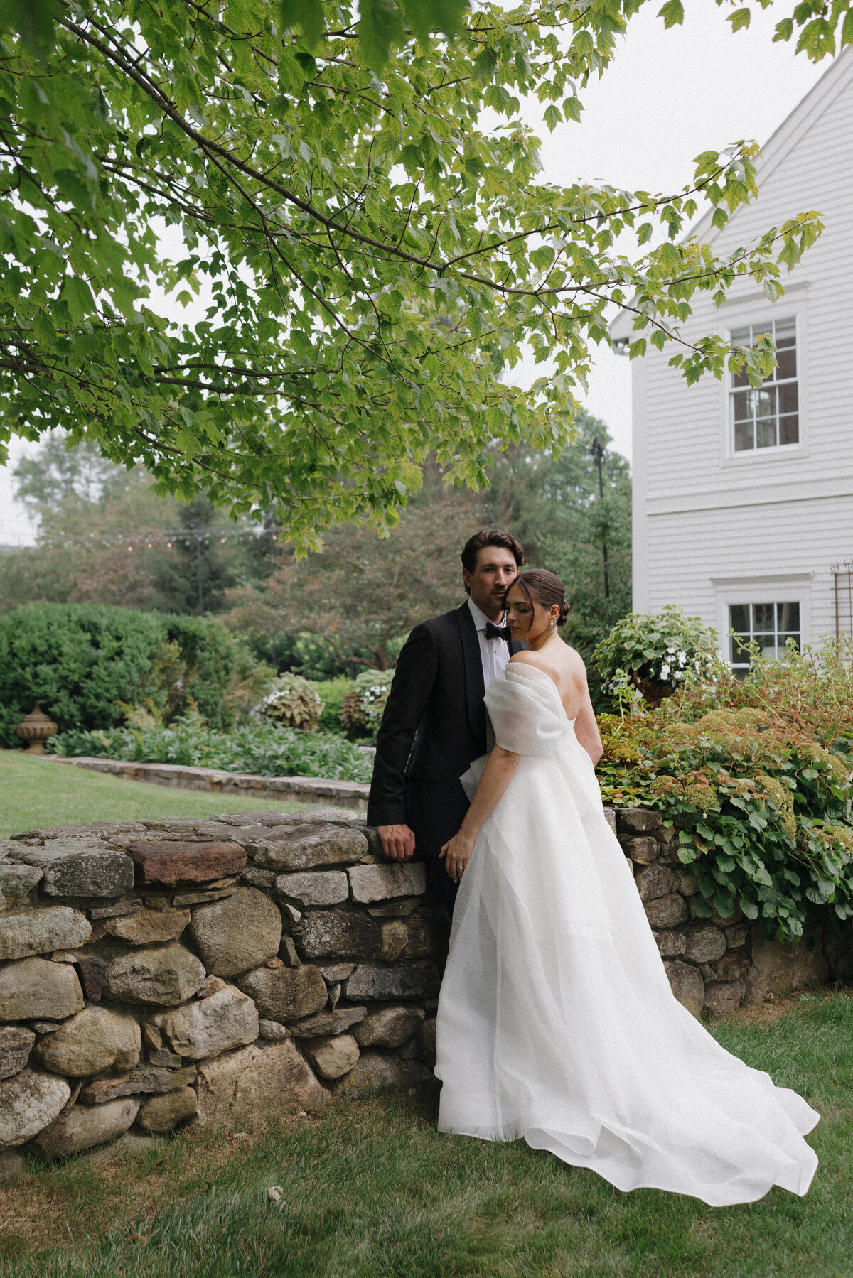 Artistic film photography capturing editorial elegance at Connecticut luxury destination wedding. Lauren Alatriste's fashion forward approach creates timeless wedding imagery that balances sophisticated composition with authentic emotional depth.