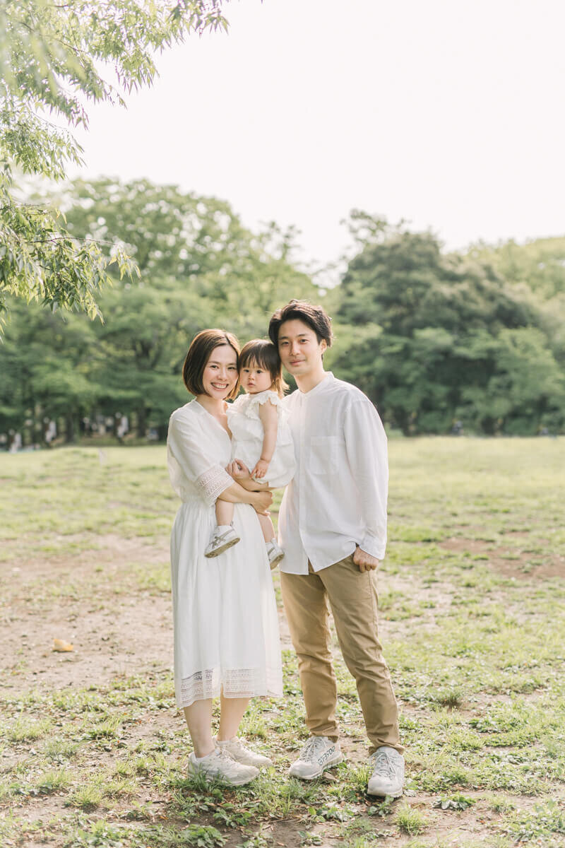 A family portrait of a mother, father and their daughter. Shot in Shibuya by Tokyo photographer, Yukika Ishkawa Photography