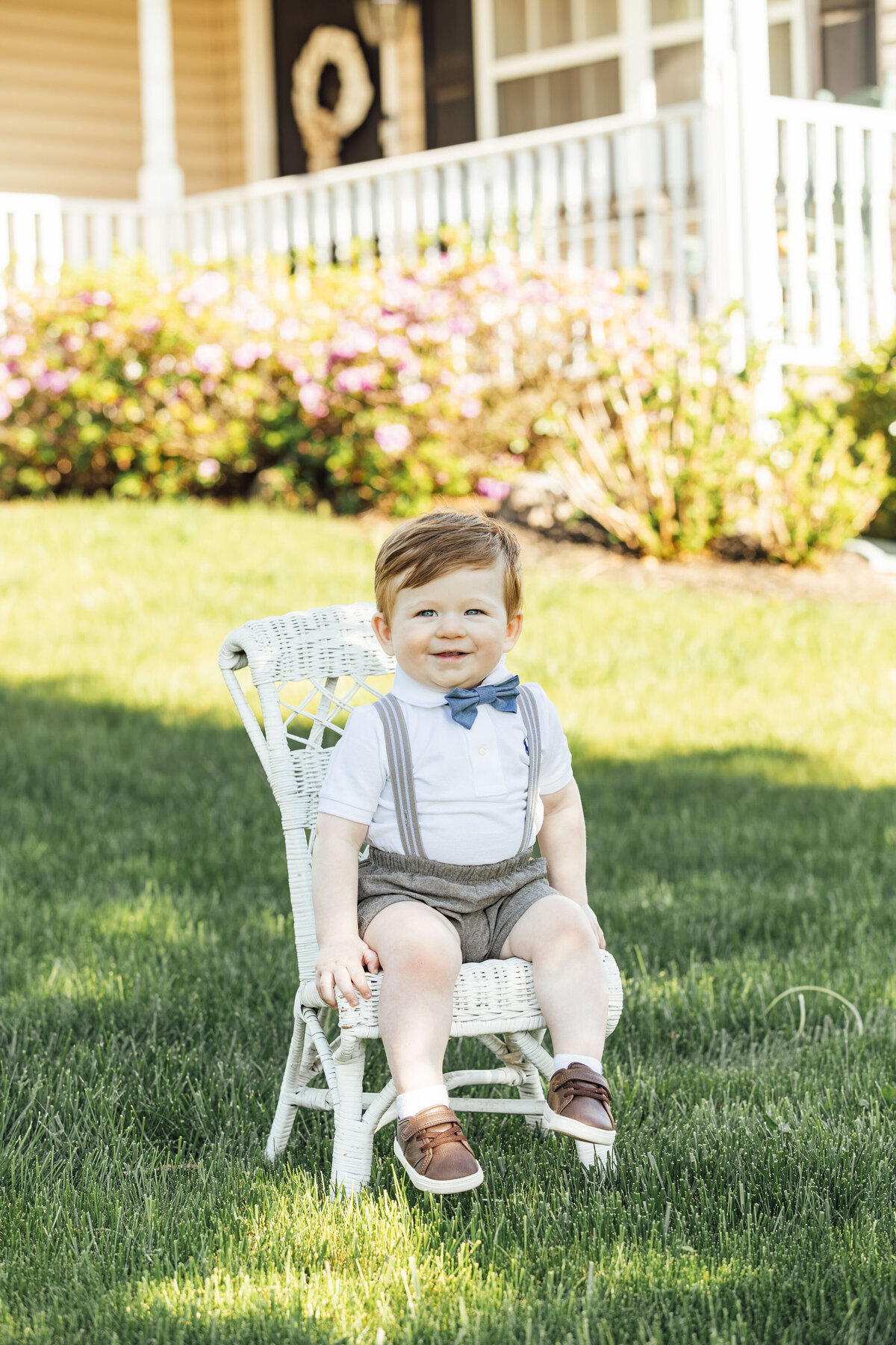 First Birthday Photographer | One-year-old smiling during first birthday celebration with family | Easton, Pennsylvania