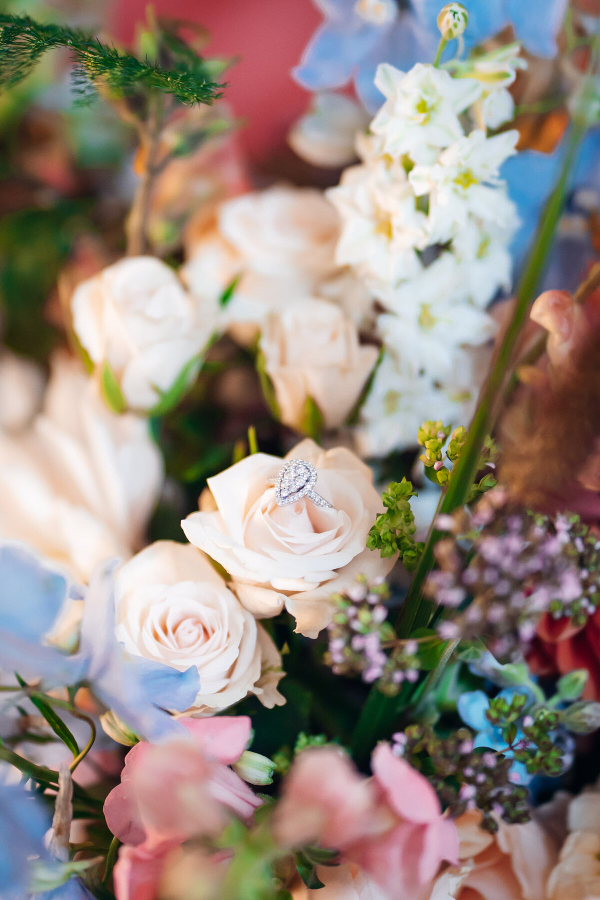 Gloucestershire-wedding-photographer-colourful-bridal-bouquet-at-pauntley-court