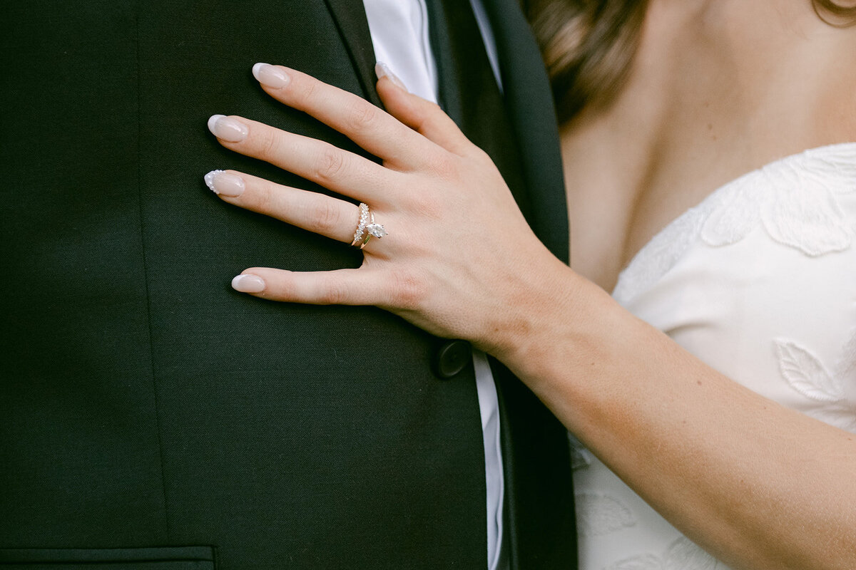 Close-up of bride’s hand showing engagement ring in natural light at San Antonio estate wedding