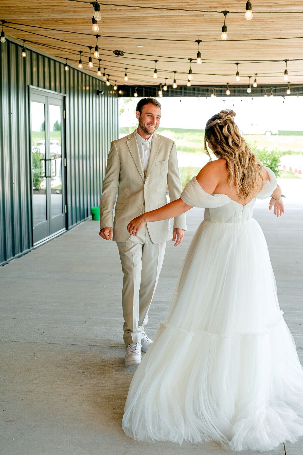 bride-twirling-groom-smiling