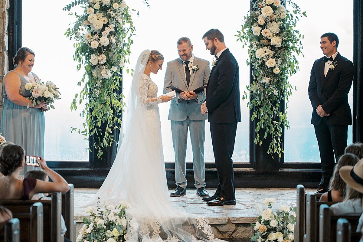 wedding-ceremony-bride-groom-chapel-flowers