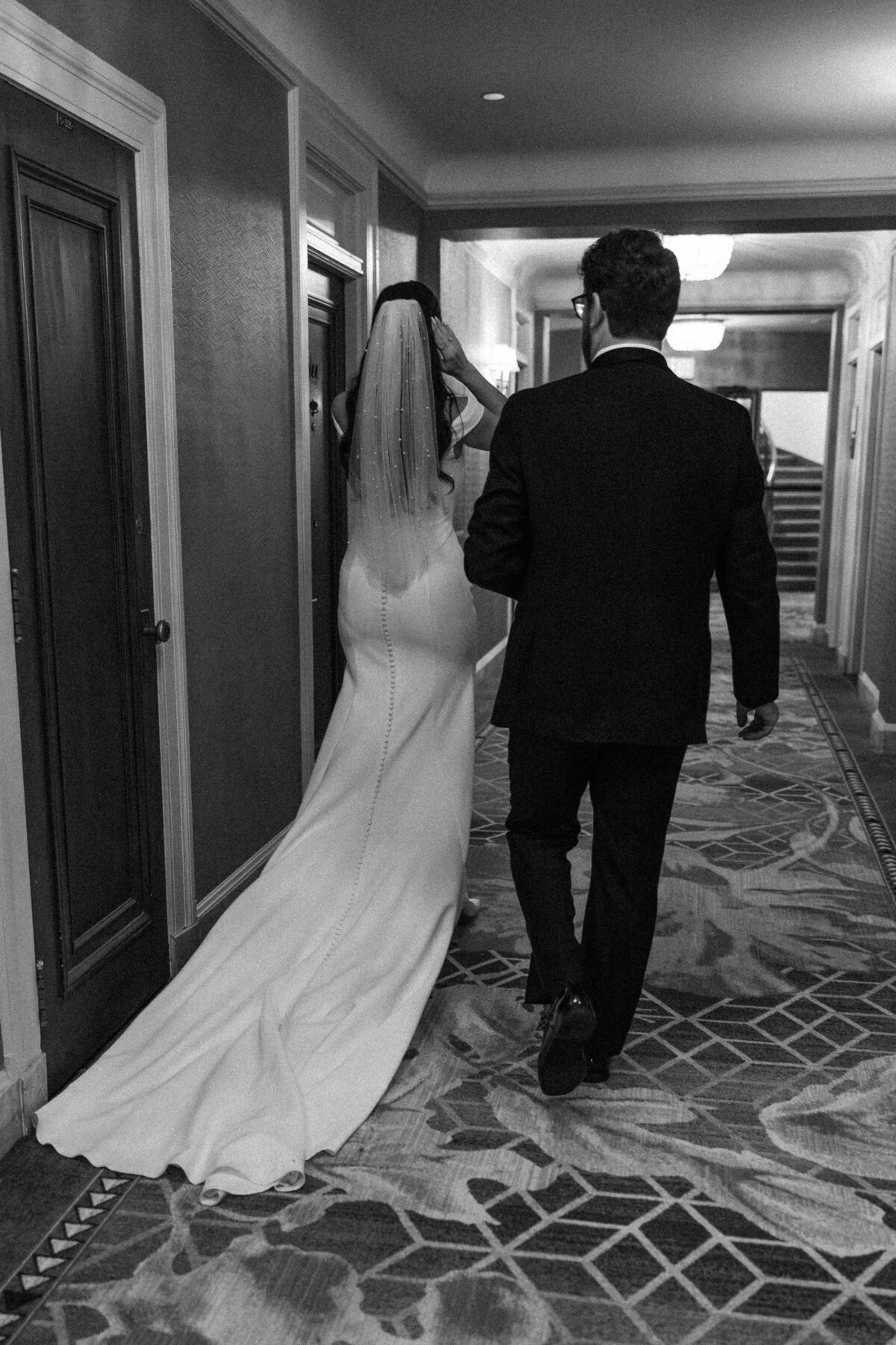 Couple walking the halls of Chateau Laurier in Ottawa