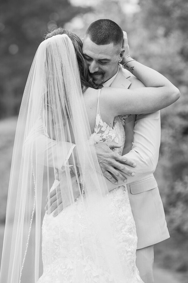 Barn-at-Blackstone-National-wedding-Kelly-Pomeroy-Photography-Nicole-Josh-first-look-1