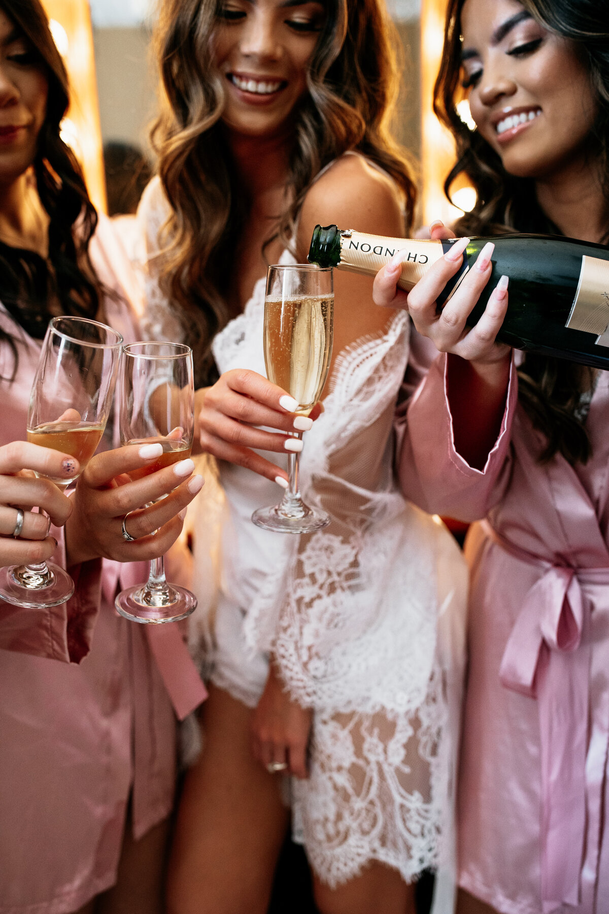 Toca-Madera-Winery-wedding-bride-bridesmaids-pouring-champagne-