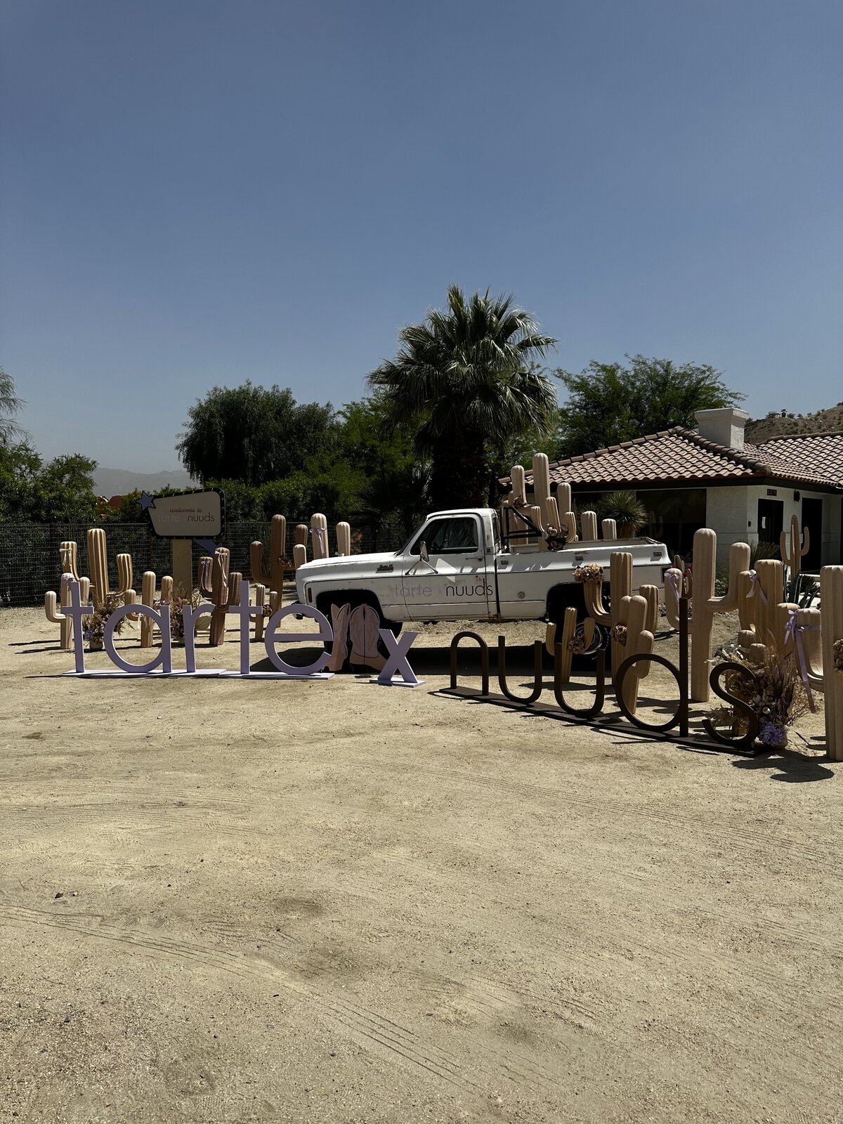 Tarte beauty activation by The Works Collective | custom poolside event installation in Palm Springs, California.
