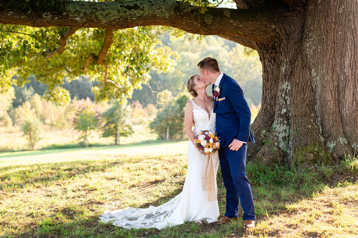 Bride and groom sharing intimate moment during traditional wedding ceremony in Maryland - Jennifer Mummert Photography
