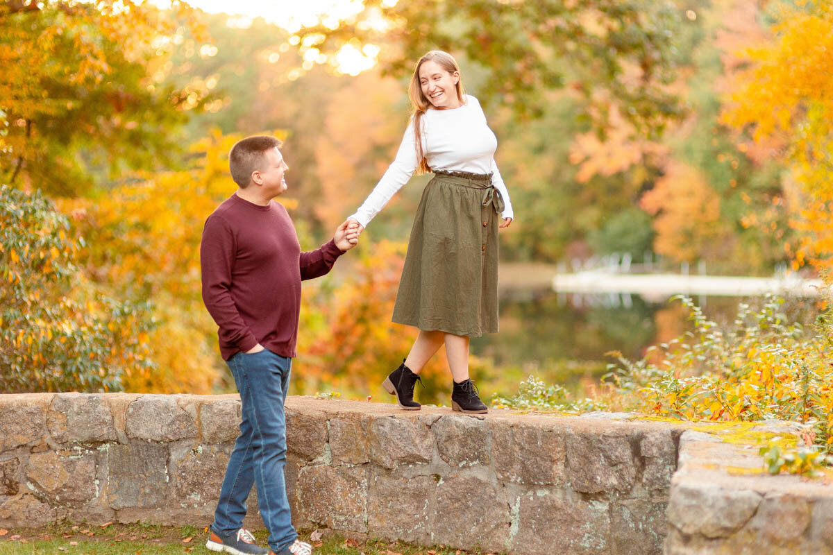 engaged-couple-walk-connecticut-college